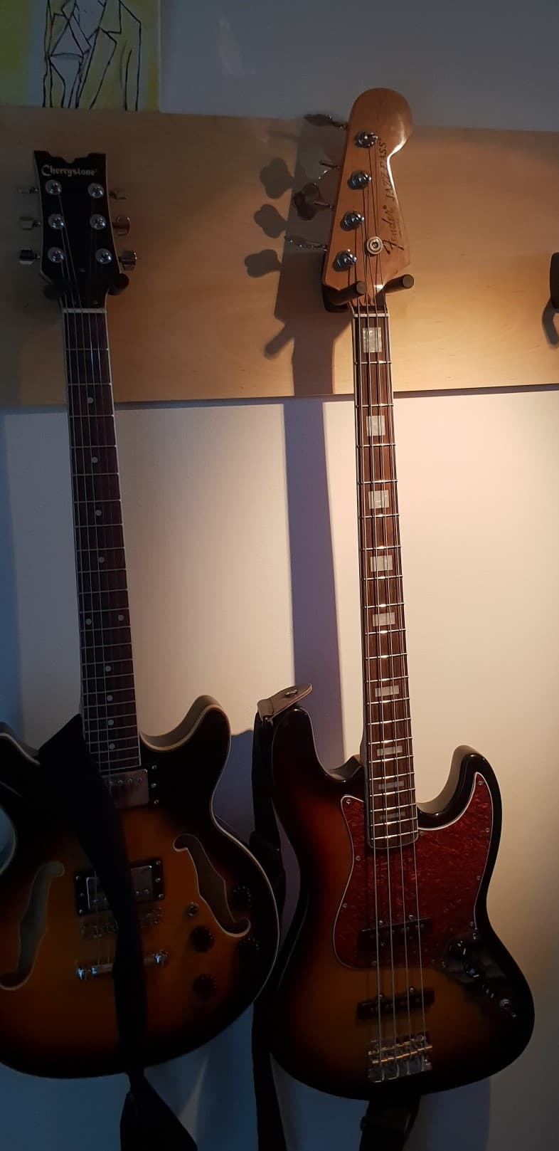 Fender JazzBasgitaar of J&D Acoustic Bass